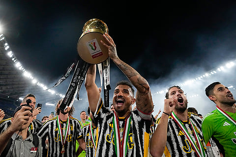 Juventus' players celebrate with Italian Cup